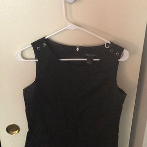 Black sleeveless dress with front zip pockets